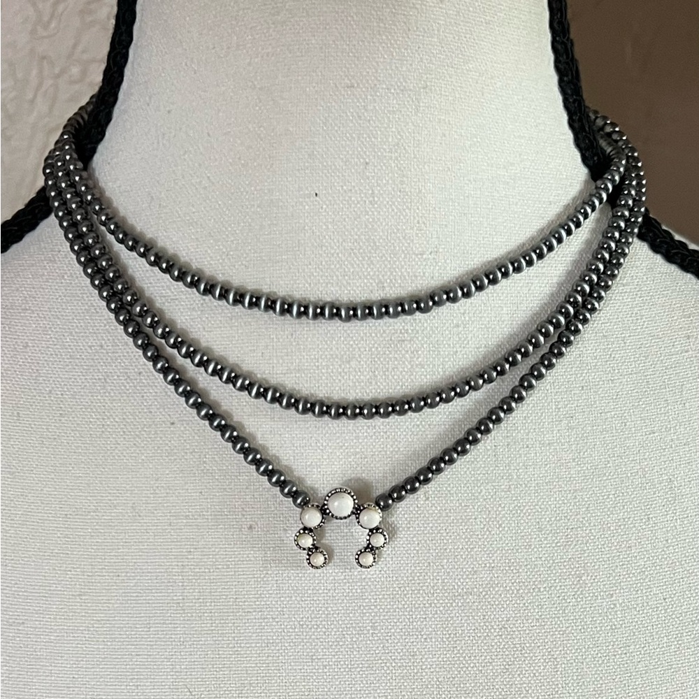 Hematite Beaded Triple-Layer Necklace with White Stone Pendant
